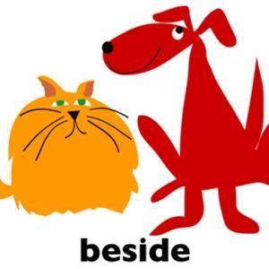 beside